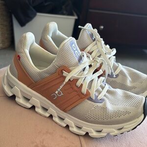 CLoudTech On Running White and Tan Sneakers